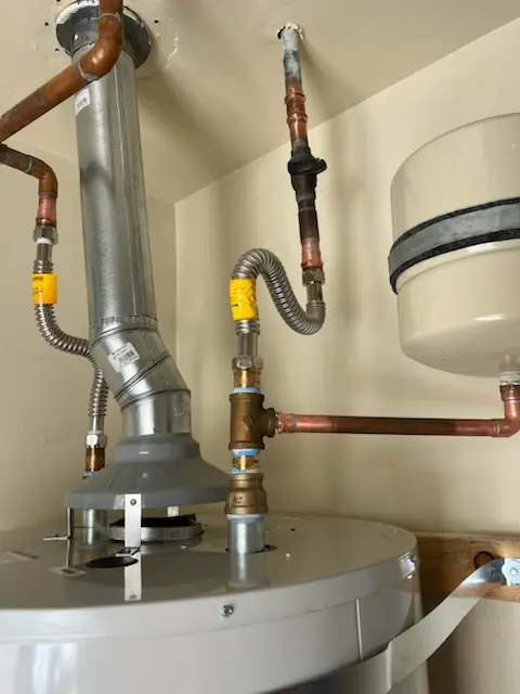 Water heater installation and plumbing repair in Kaser